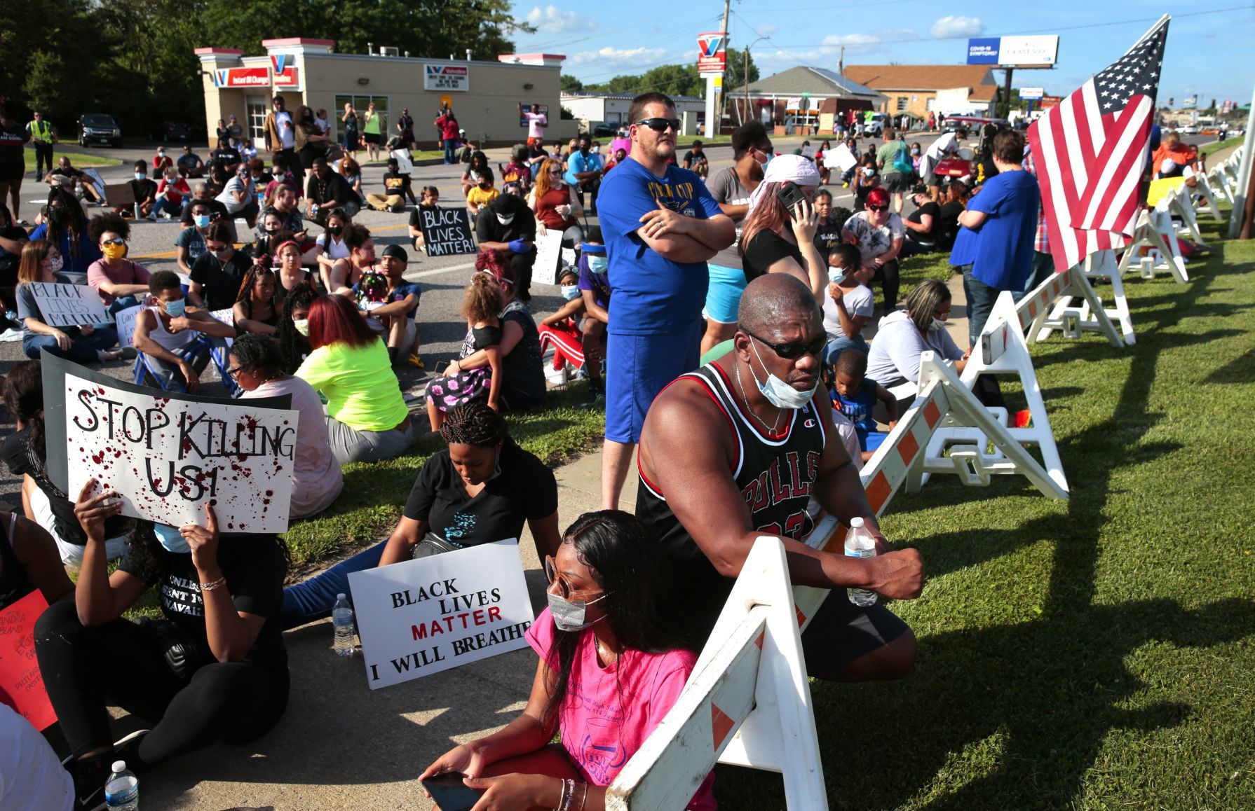 Protesters march in Florissant